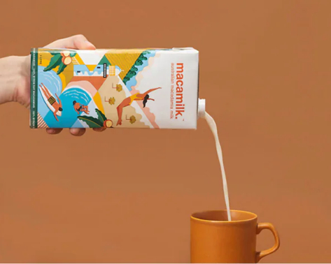 Macamilk being poured into a cup